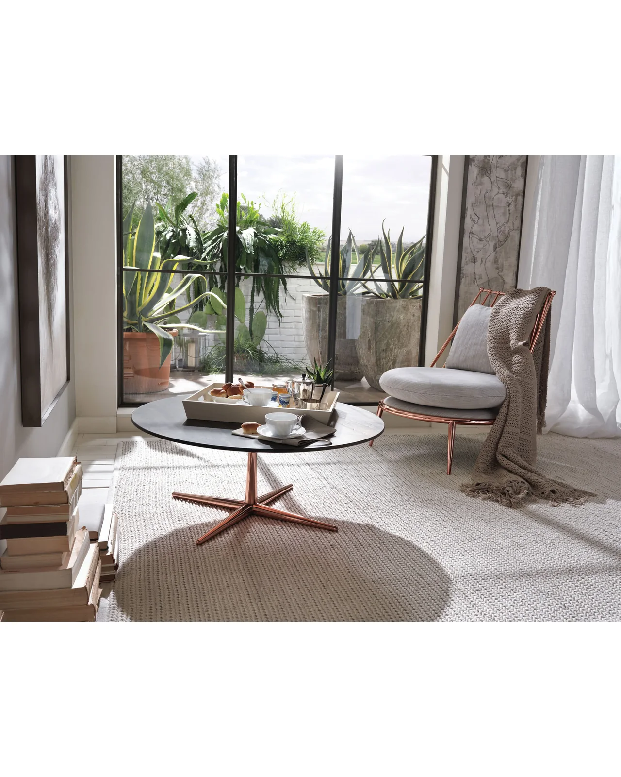 Aurora iron back armchair by Cantori, in an interior setting, photo 3 of 8