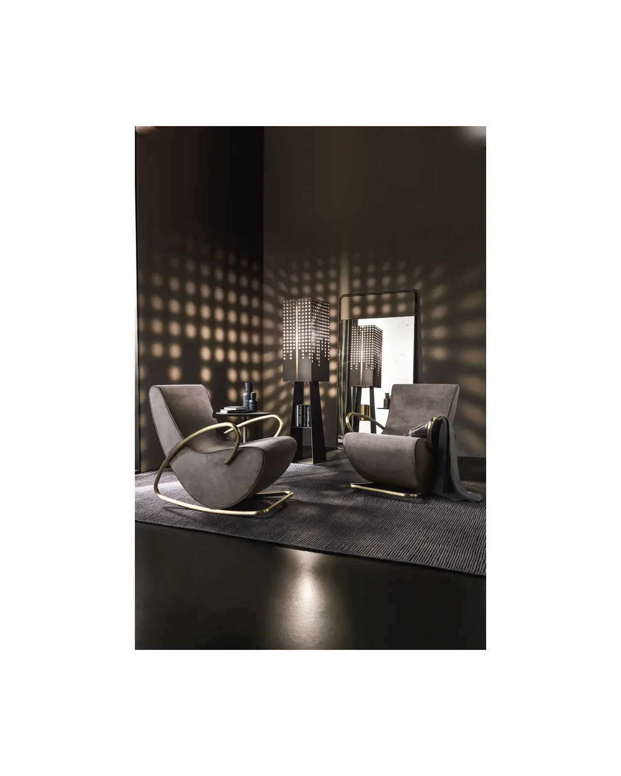 Camilla rocking armchair by Cantori, in an interior setting, photo 4 of 9